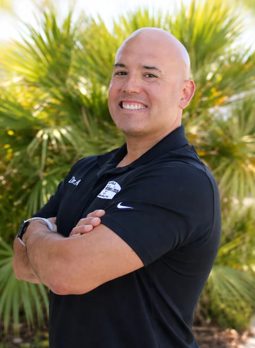Chiropractor Jorge Aranibar posing for a professional photo