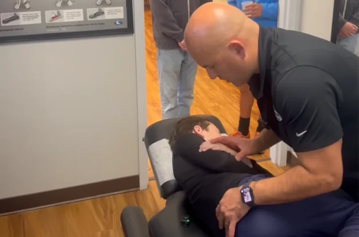 Dr. Aranibar performing a back pain adjustment