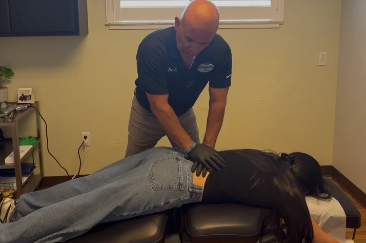 Dr. Aranibar adjusting a sciatica patient